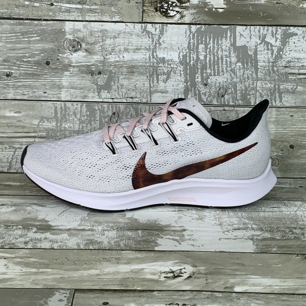 Nike Women's White Pink Lace Running Shoes with Brown Swoosh